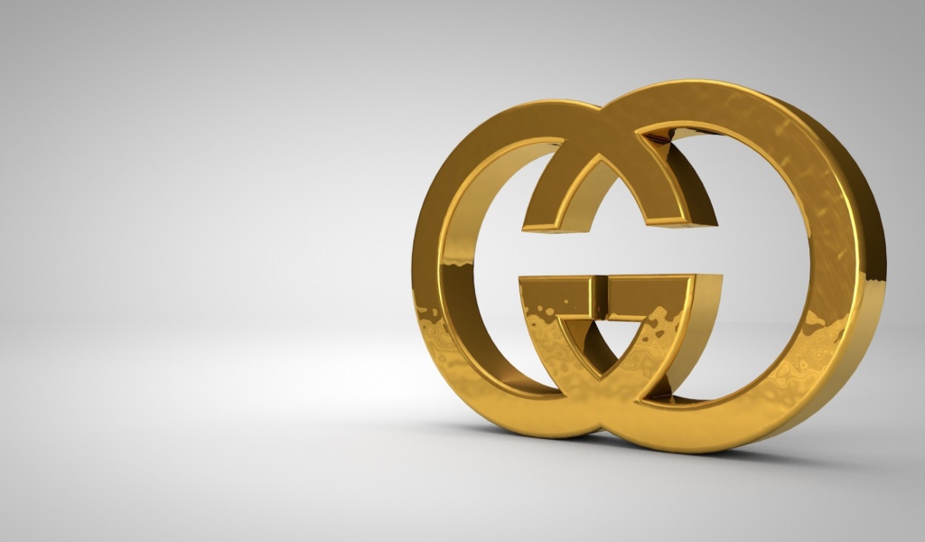 Золотой символ Gucci