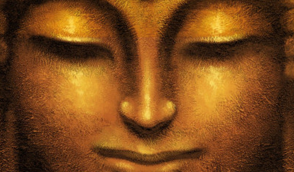 Face of golden Buddha