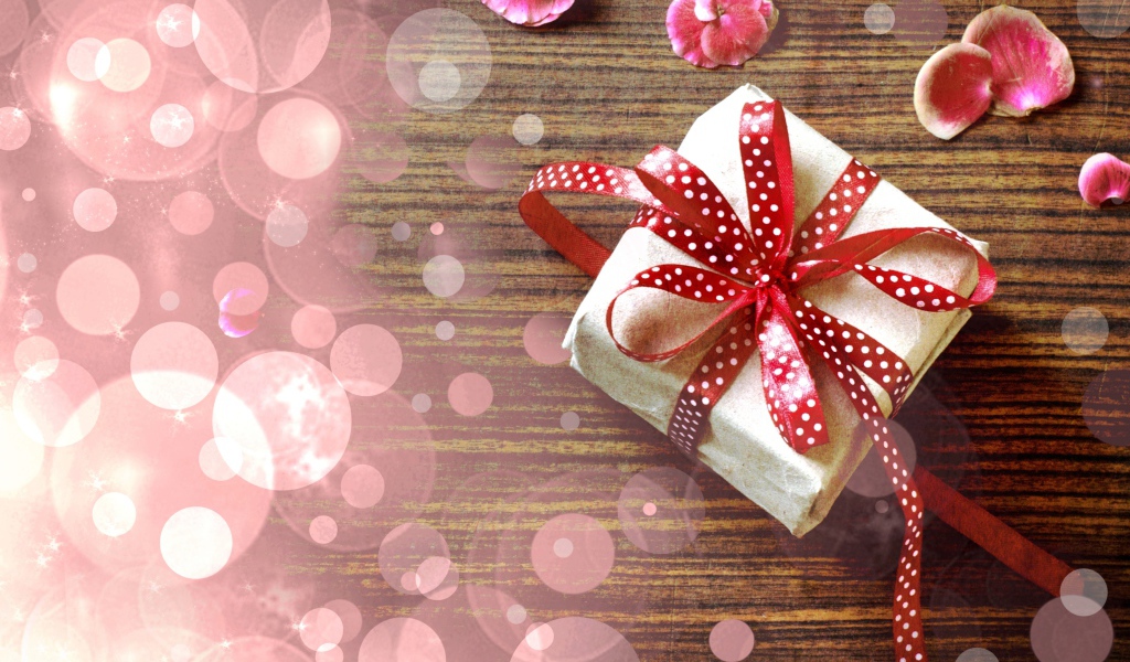 Обвязанный лентой подарок