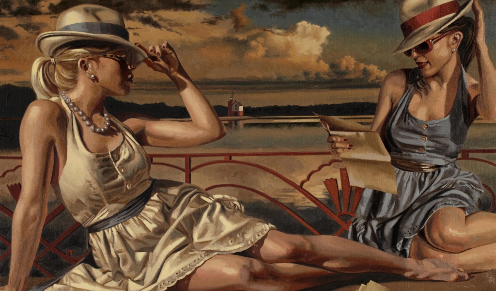 Девушки отдыхают на берегу озера