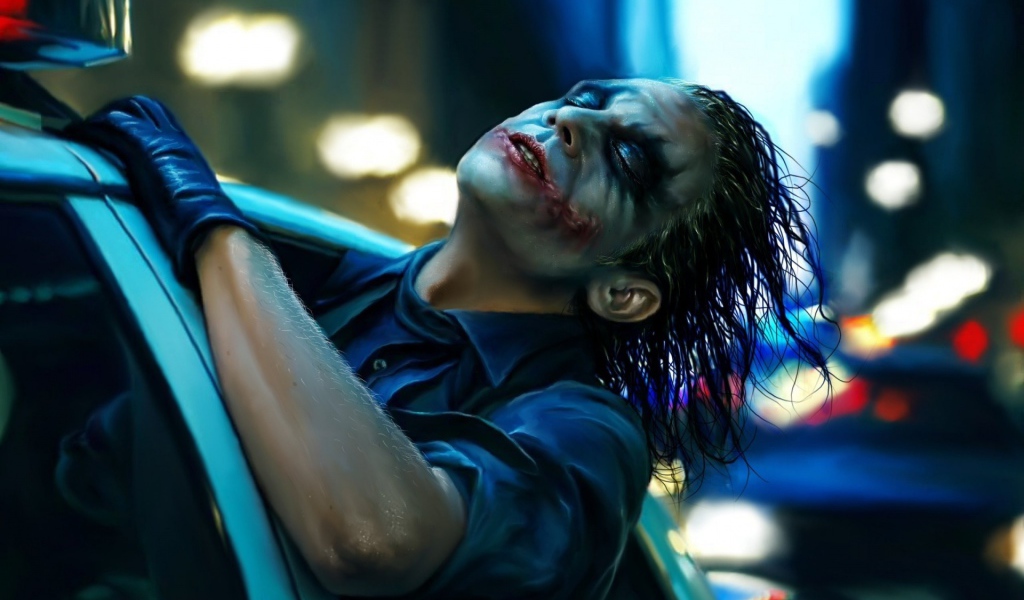 Джокер в полицейском автомобиле