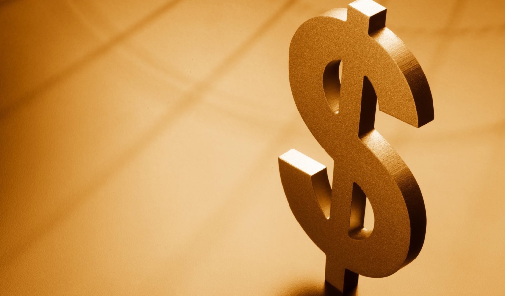 Металлический знак доллара