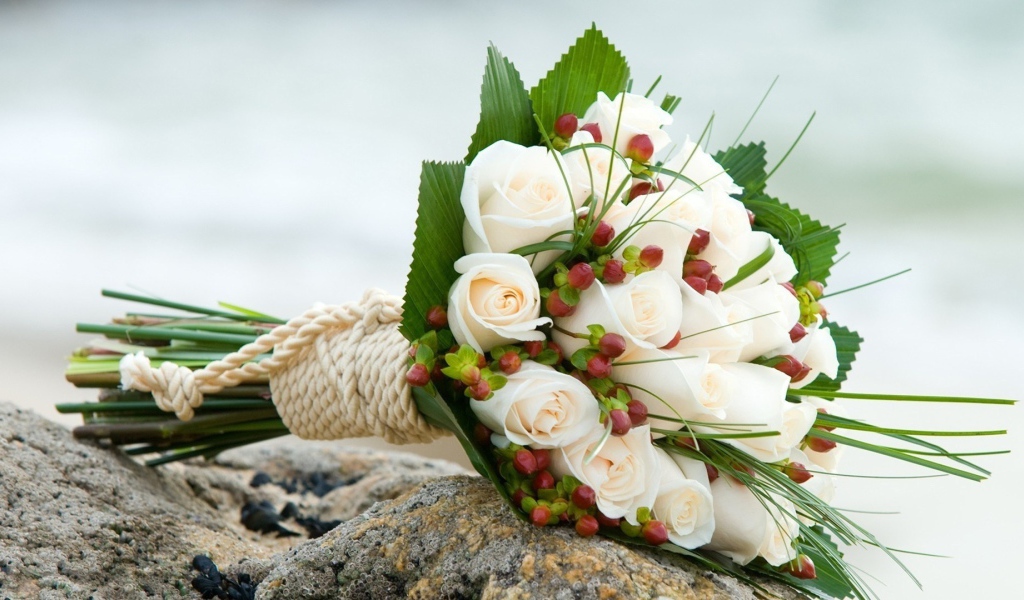 White roses in a wedding bouquet
