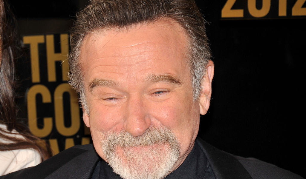 Актер Робин Уильямс улыбается