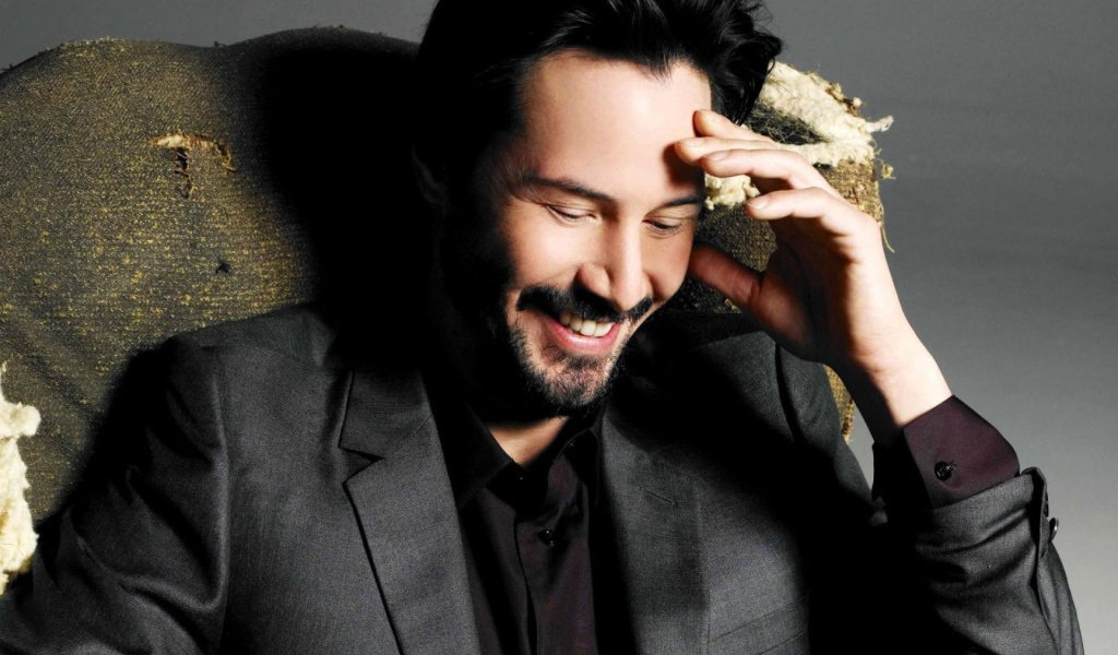 Киану Ривз смеется