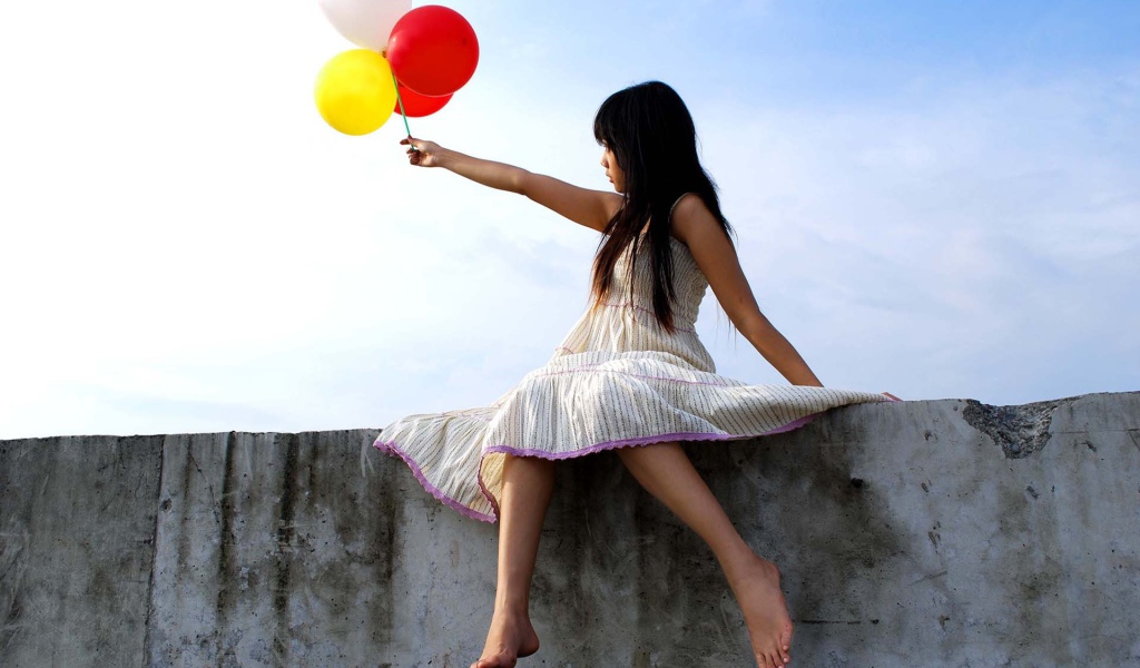 Девочка с воздушными шарами