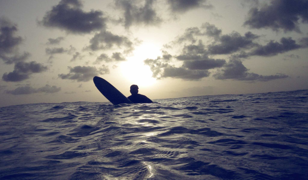 Серфер в Барбадосе