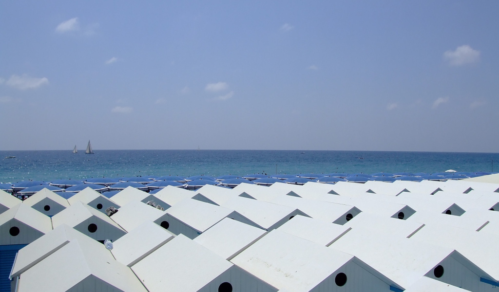 Пляжные домики на курорте Челле Лигуре, Италия