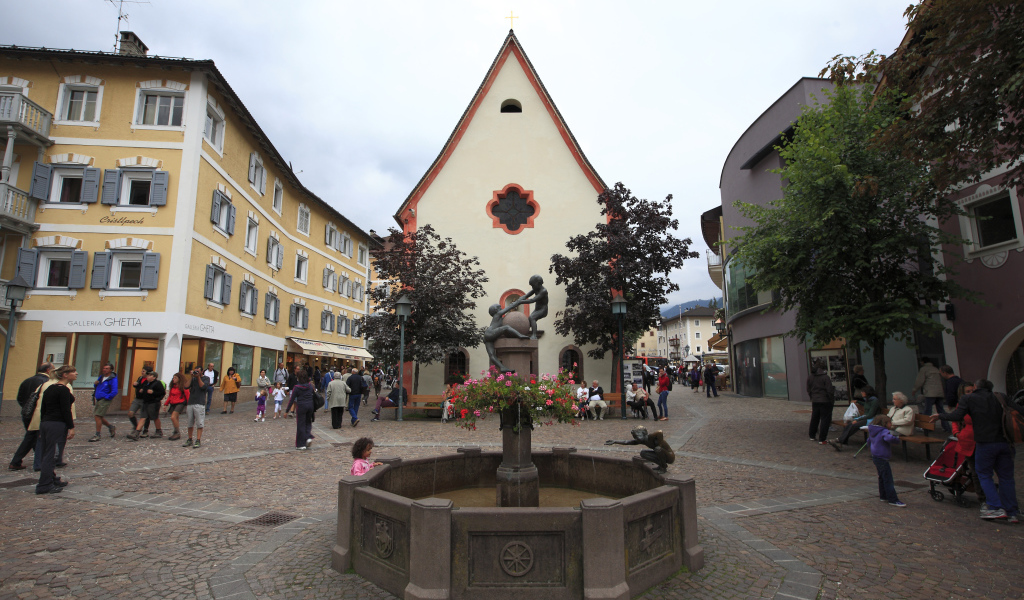 Fountain in the square in Ortisei, Italy