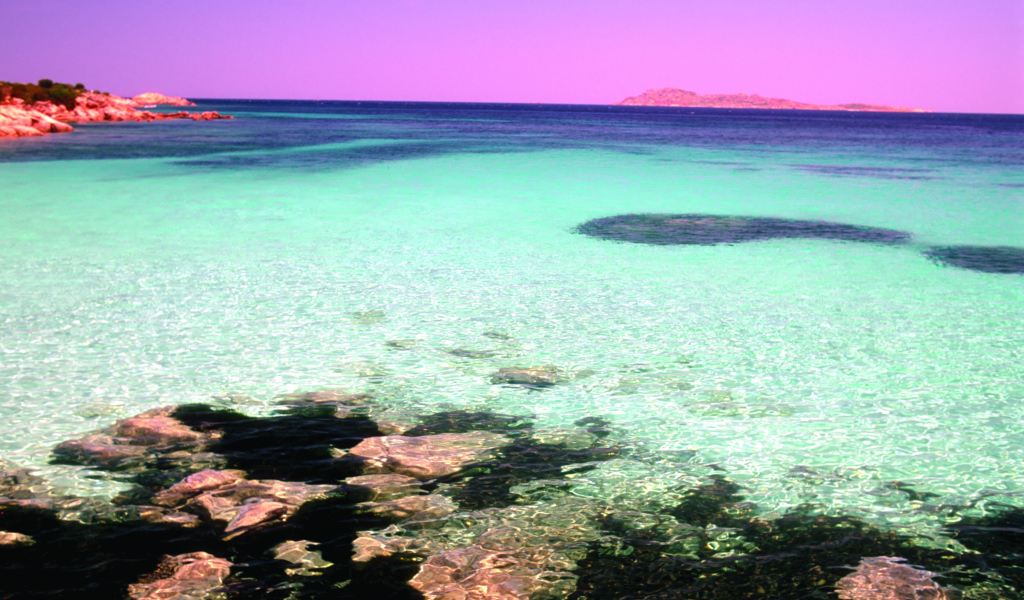 Закат на берегу моря на острове Сардиния, Италия