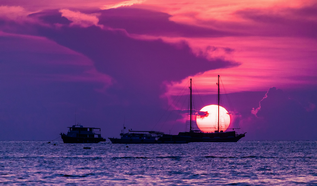Boats at sunset at a resort in Pattaya, Thailand