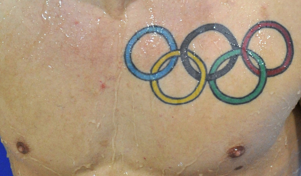 Олимпийские кольца татуировка