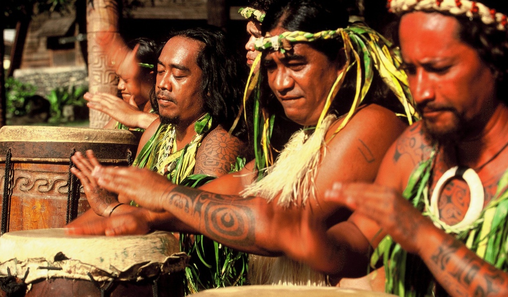 Polynesian tattoos on his arms