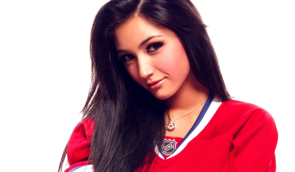 Женщина хоккеист