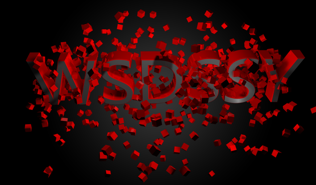 Буквы из красных кубов на черном фоне