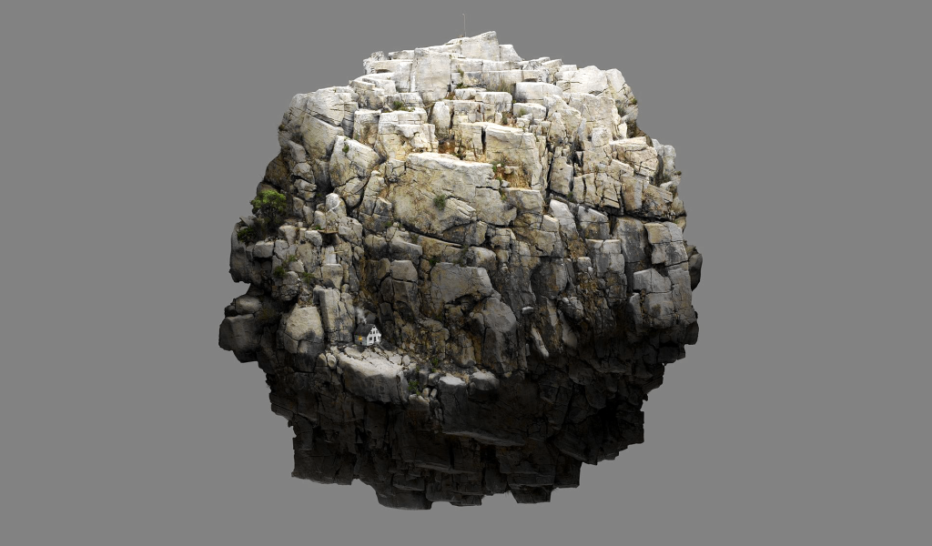 Круглый камень на сером фоне