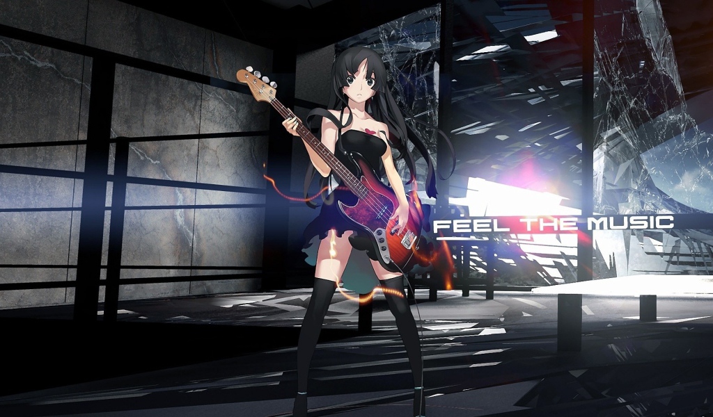 Девушка аниме Akiyama Mio с гитарой