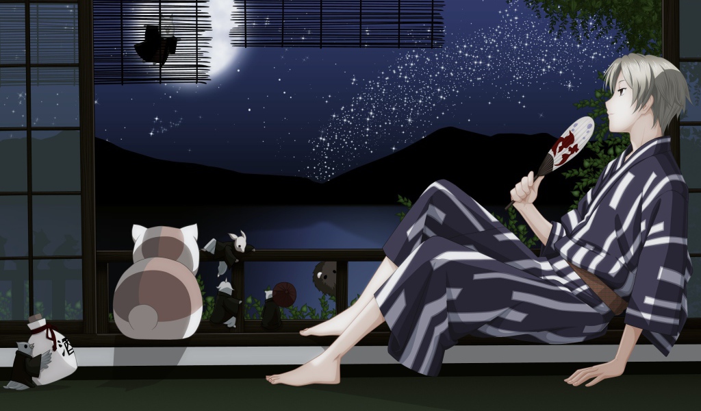 Парень и кот смотрят на луну