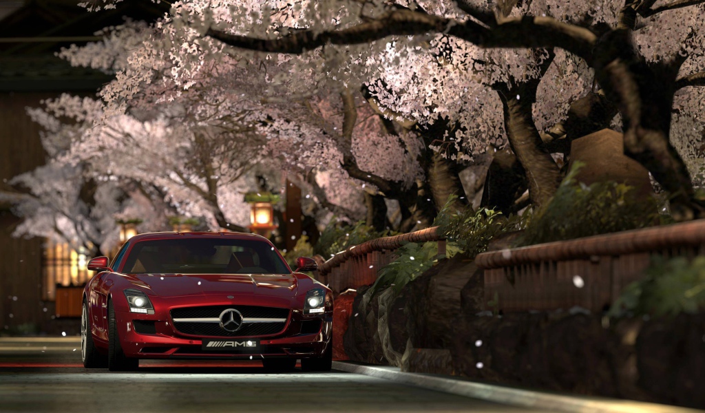 Красный Мерседес Gran Turismo под сенью сакуры