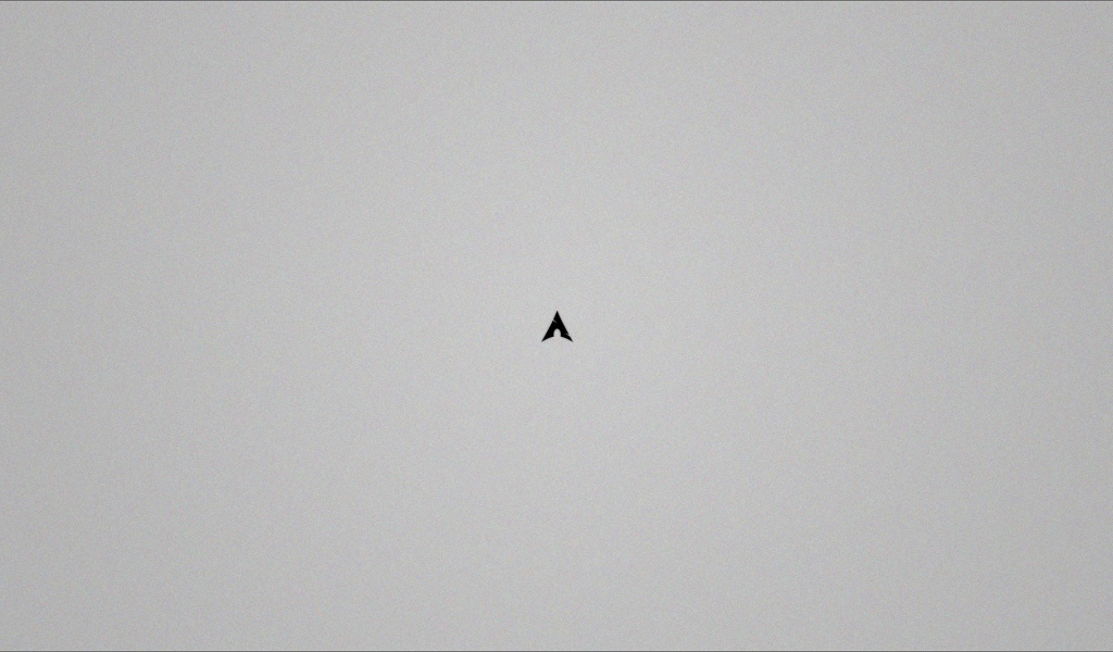 Маленький черный треугольник на сером фоне