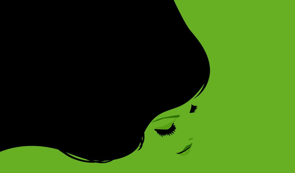 Черные волосы девушки, зеленый фон