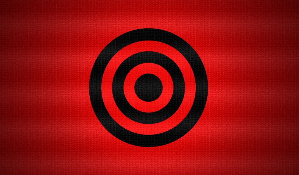 Черная мишень на красном фоне