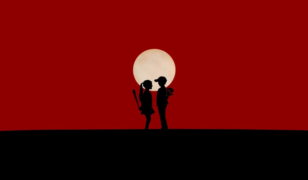 Мальчик и девочка на красном фоне