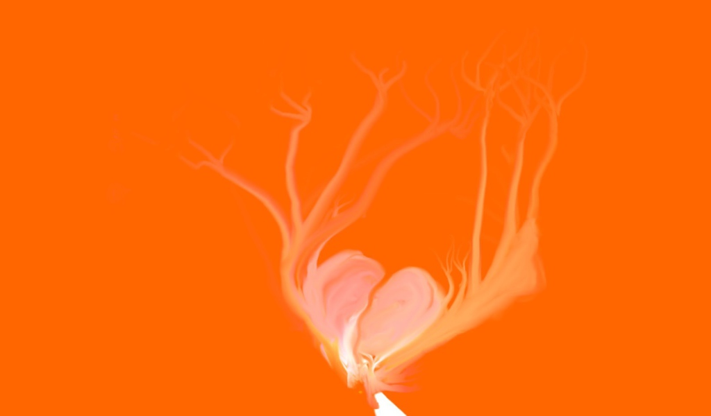 Розовое сердце на оранжевом фоне