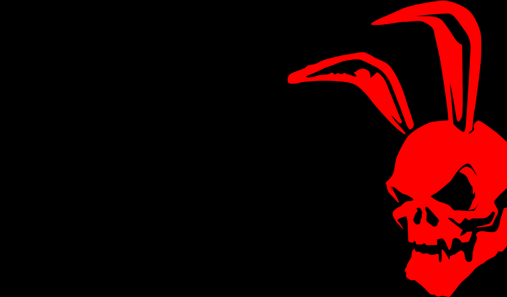 Красный череп с заячьими ушами на черном фоне