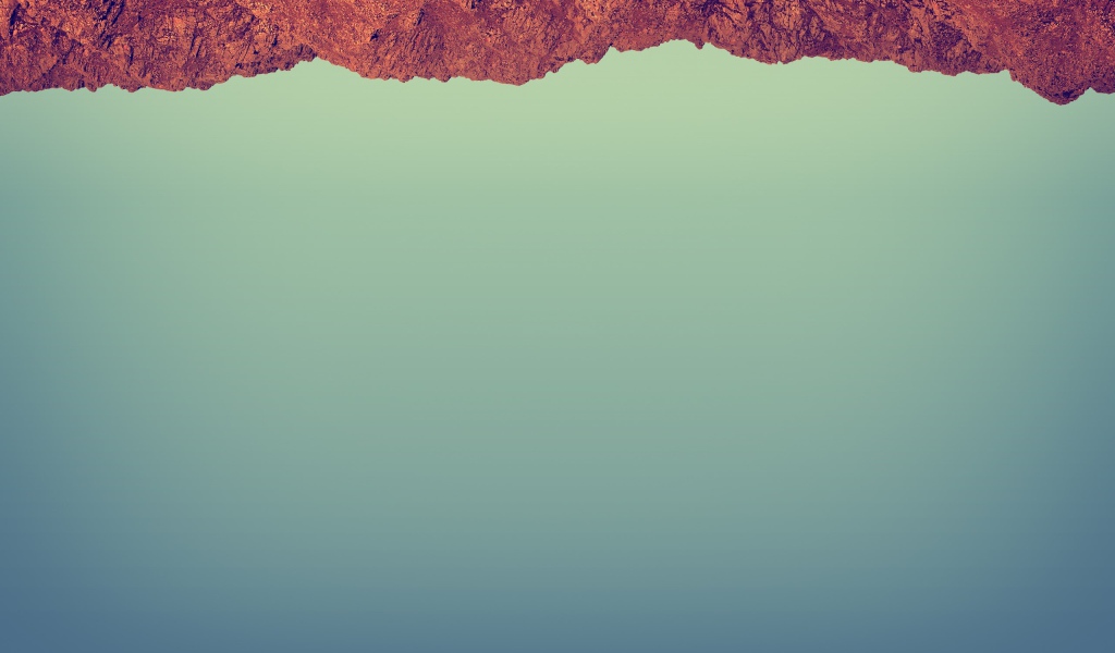 Красный камень на сером фоне