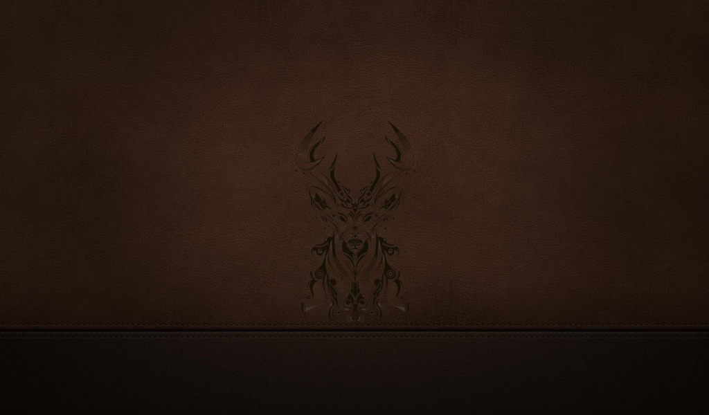 Силуэт оленя на коричневой коже