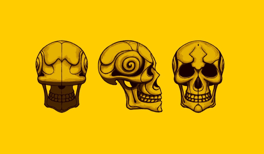 Черепа на желтом фоне