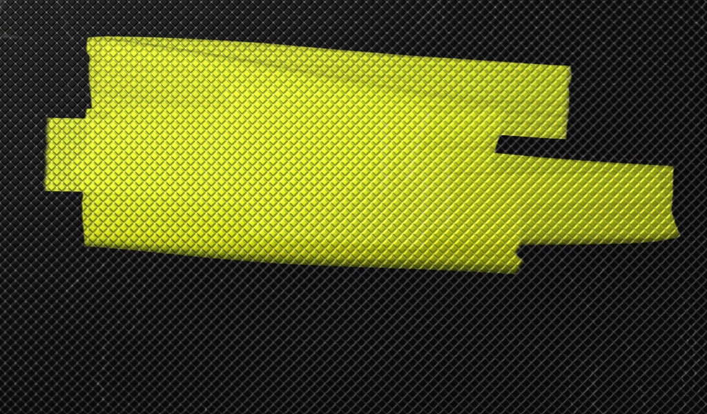 Желтая краска на сером фоне