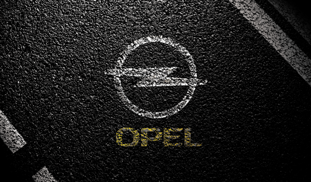 Символ Опель на асфальте