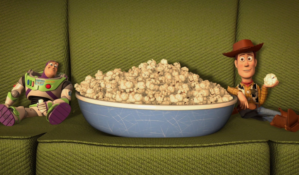 Персонажи мультфильма История игрушек кушают попкорн