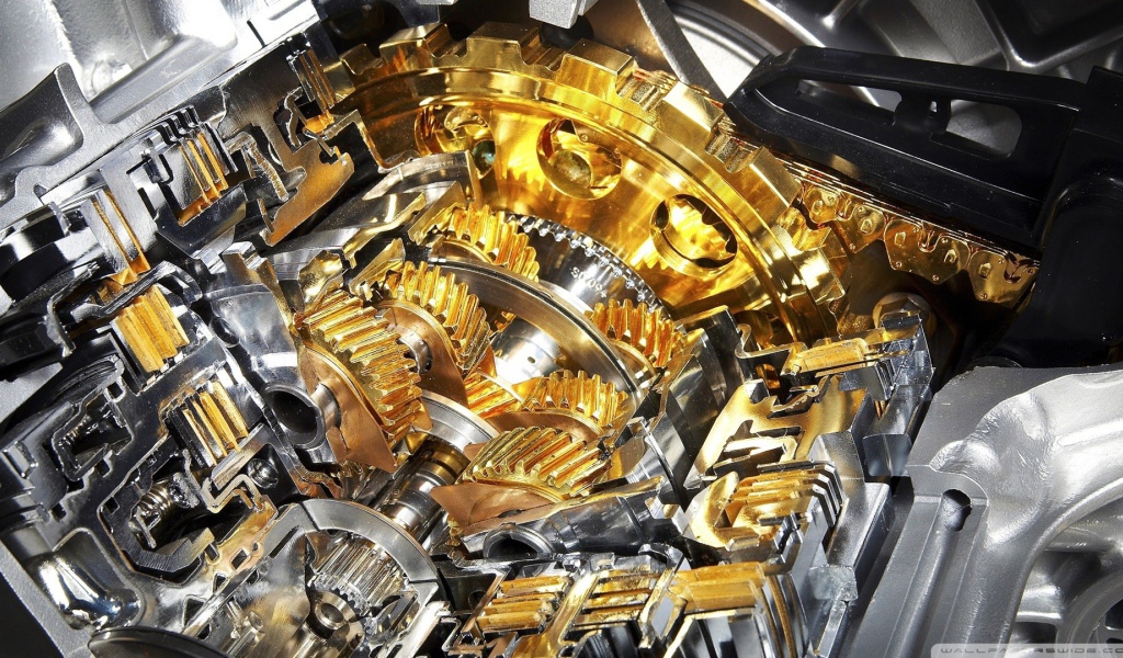 Позолоченные шестеренки в двигателе