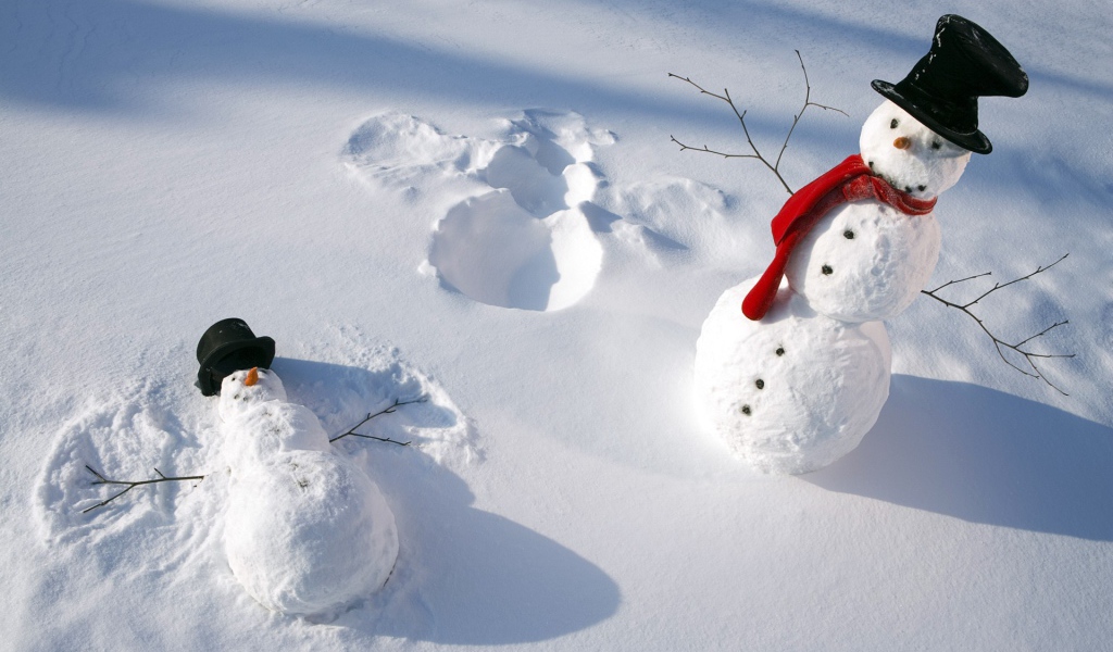 Snowmen make snow angels