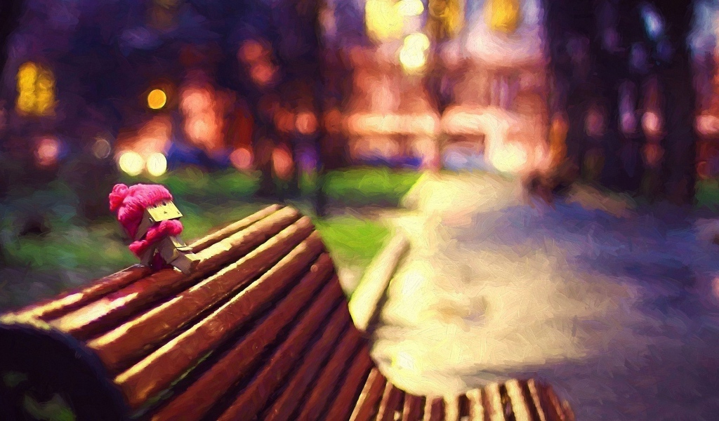 Человечек из картона на скамье