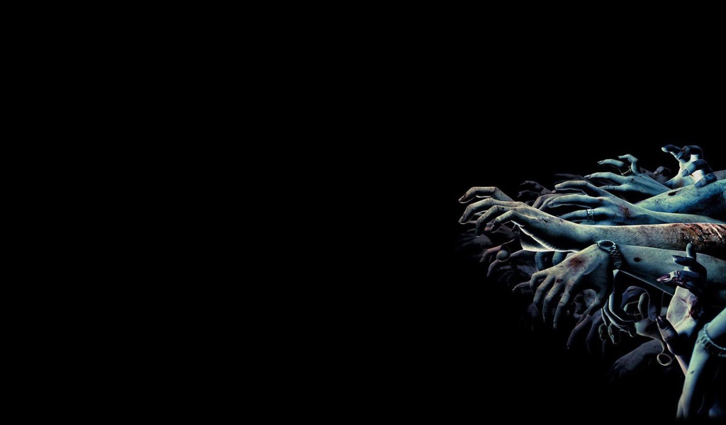 Руки толпы зомби на черном фоне