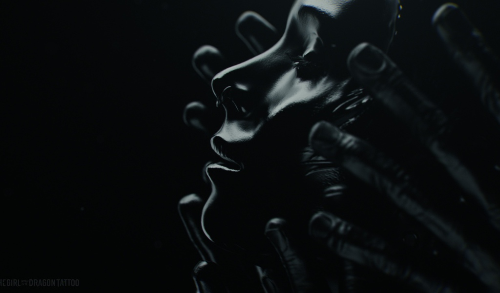 Лицо девушки в черных ладонях