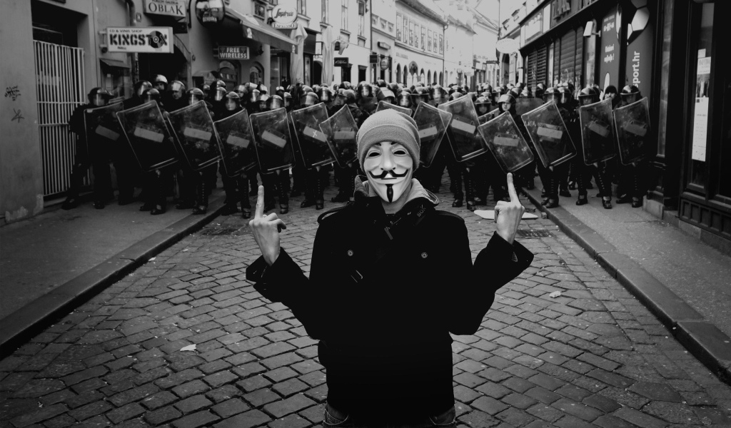 Anonymous on the background of police