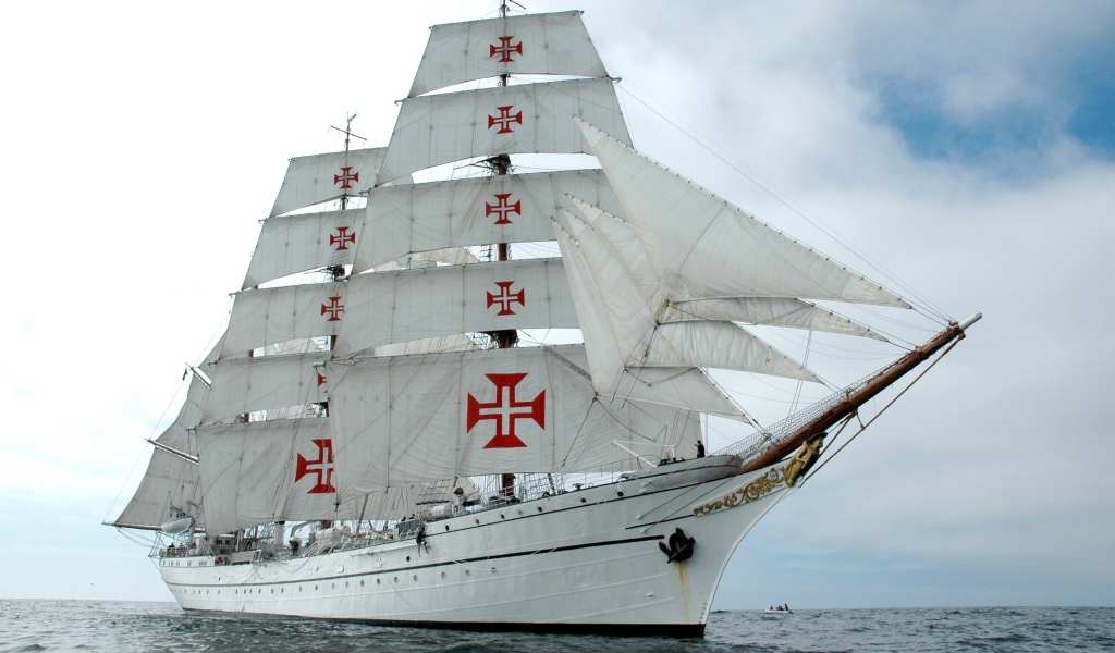 The crosses on the white sails of the ship