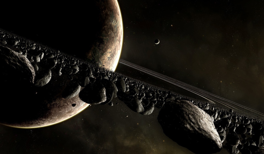 Черные камни в кольце Сатурна