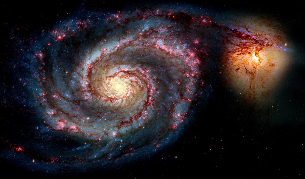 Слияние галактик в космосе