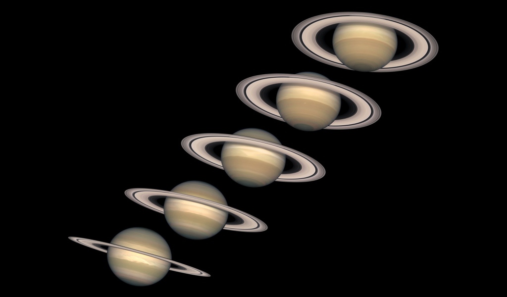 Несколько одинаковых планет на черном фоне