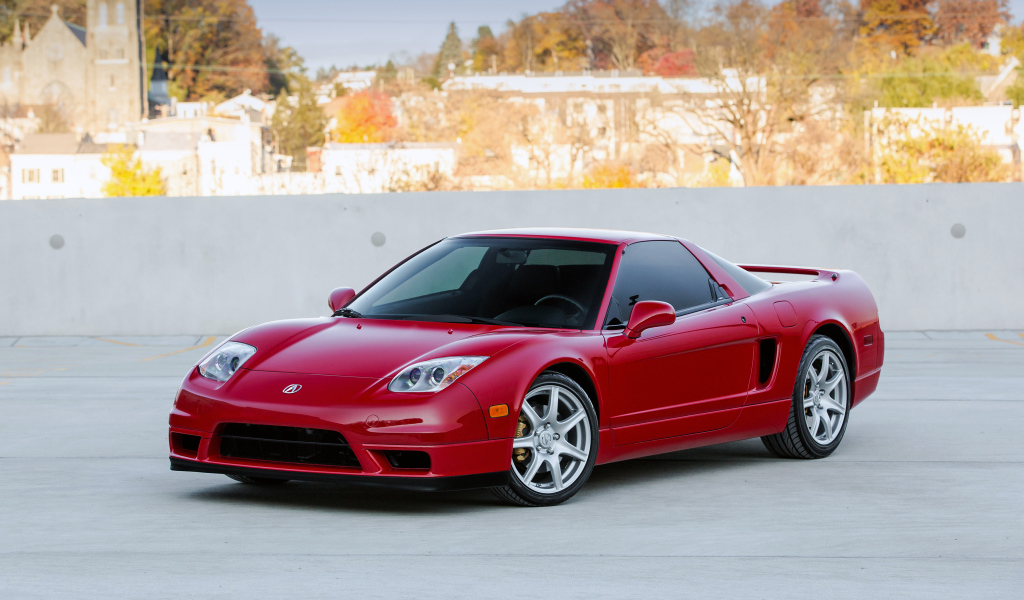 Спортивный красный автомобиль Acura NSX 