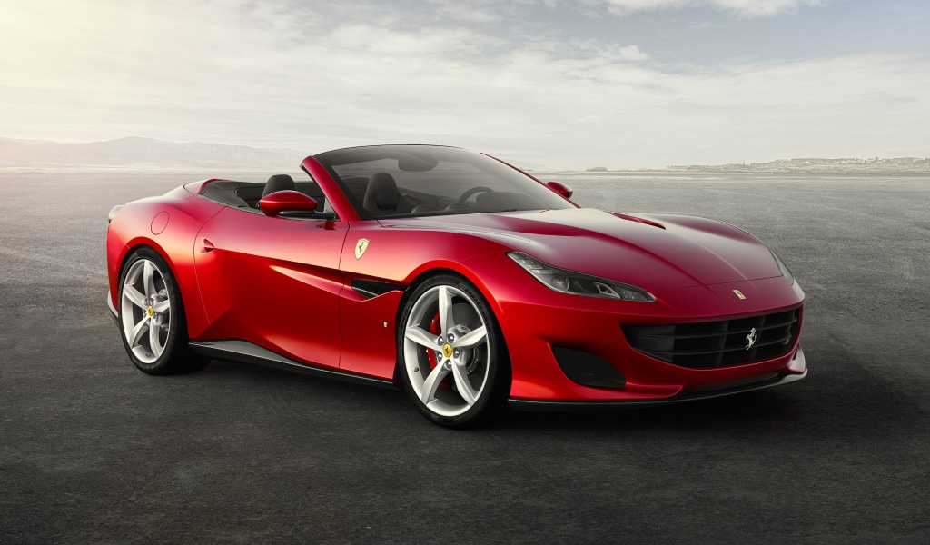 Красный спортивный автомобиль кабриолет Ferrari 812 Superfast