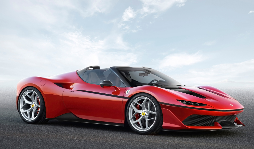 Красный спортивный автомобиль Ferrari J50