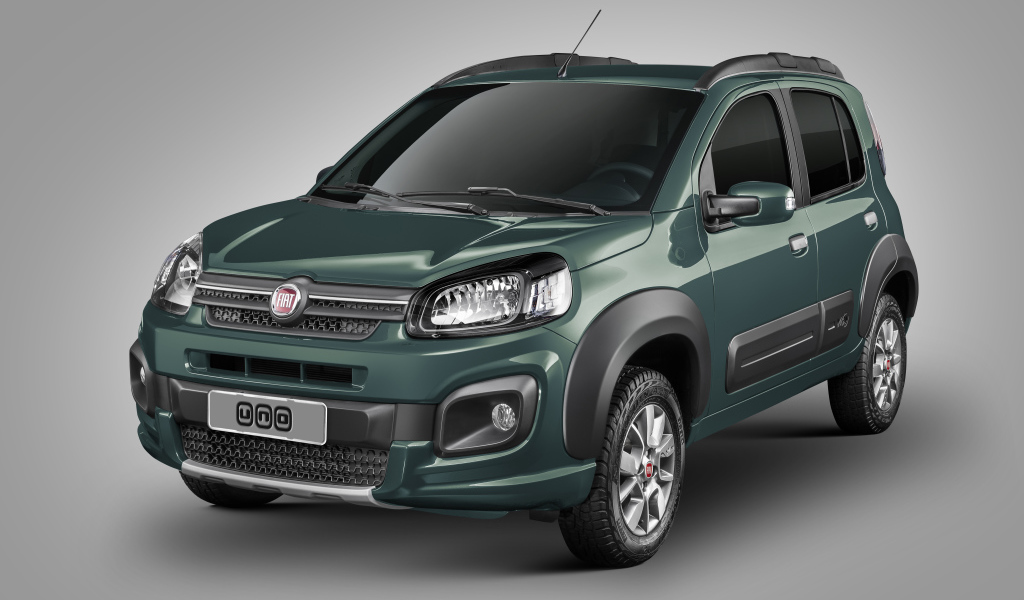 Зеленый автомобиль Fiat Uno Way на сером фоне