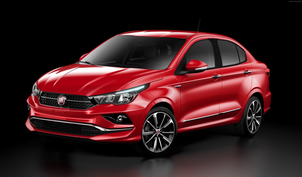 Красный автомобиль  Fiat Cronos, 2018 на черном фоне